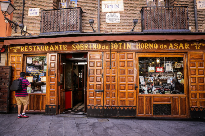 Sobrino de Botín (Calle de los Cuchilleros 17, 28005 Madrid, Spain) is a restaurant established in 1725. Along with Den Gyldene Freden (opened in 1722), it is one of the oldest eateries at its original location in the world. The artist Francisco de Goya worked there as a waiter while waiting to get accepted into the Royal Academy of Fine Arts.