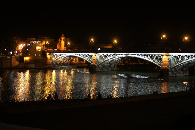 Isabel II bridge is also popularly called Puente Triana, as you continue on towards the heart of Triana quarter. Here the bridge is based on the remains of the former San Jorge castle, which was the last headquarters of the Inquisición in Seville