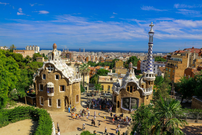 Park Güell is a garden complex with architectural elements situated on the hill of El Carmel in the Gràcia district of Barcelona